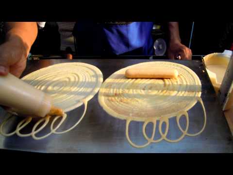 شاهد وجبة خفيفة من طعام الشارع في بانكوك