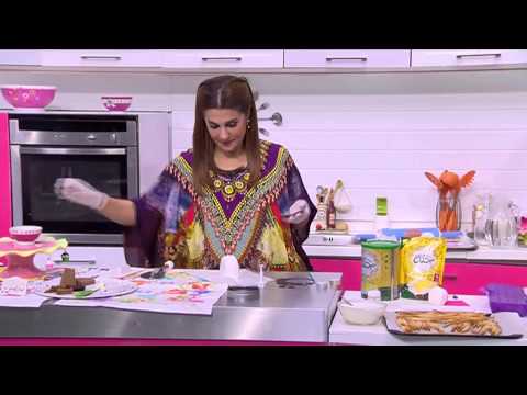 شاهد طريقة تزيين كيكة الشنطة