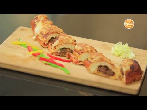 بالفيديو طريقة عمل بيتزا رول السجق