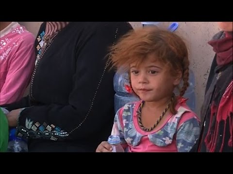 شاهد عراقيون نازحون من مدينة الحويجة يجدون ملجأ لهم في كركوك