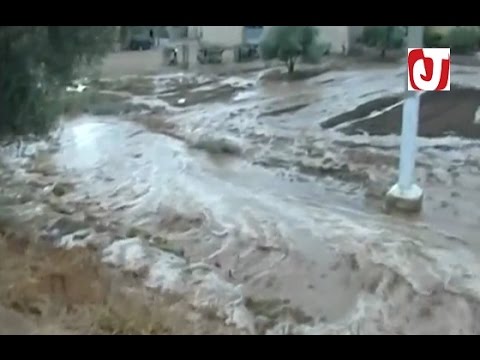 بالفيديو أضرار كبيرة وسيول جارفة تلحق خسائر مادية في عين تاوجطات
