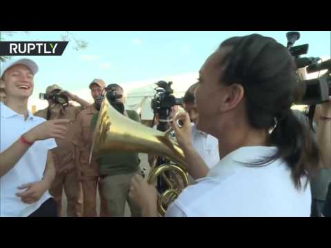 أبطال ألعاب ريو الروس يزورون حميميم