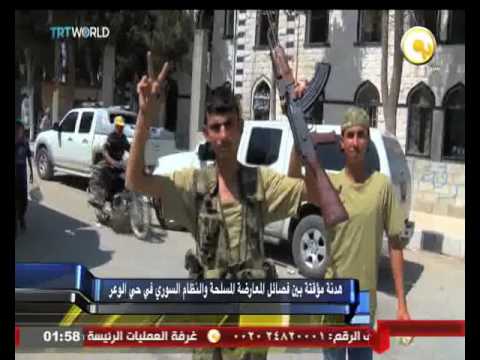 بالفيديو هدنة مؤقتة بين فصائل المعارضة المسلحة والنظام السوري في حي الوعر