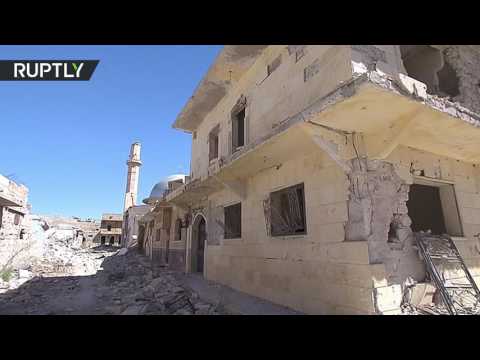 بالفيديو سكان حلب يحاولون العودة إلى بيوتهم المدمرة في سورية