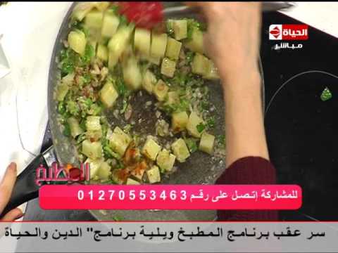 طريقة عمل طاجن سمك بالخضار