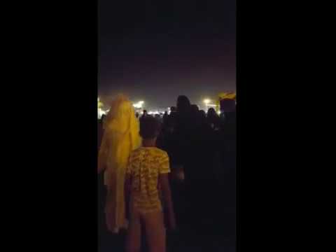 شاهد توقيف رجل متخف في زي امرأة