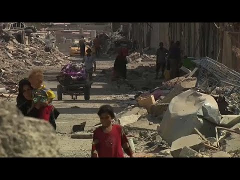 شاهد نازحو الموصل يعودون إلى ديارهم