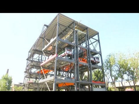 شاهد مرآب عمودي آلي للحافلات في الصين