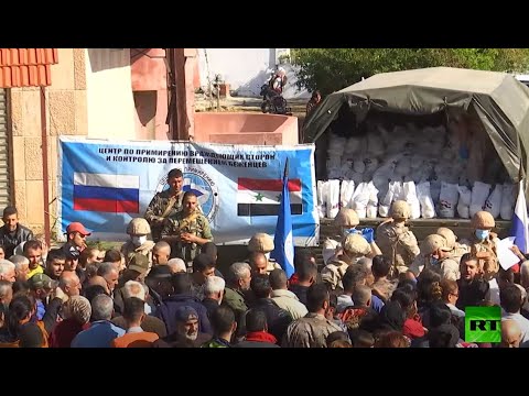 قافلة مساعدات إنسانية روسية إلى قرية تعرضت لحرائق في سورية