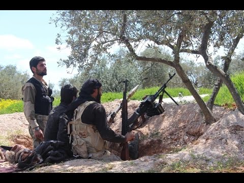 شاهد المعارضة تتقدم في سهل الغاب وتسيطر على قرية