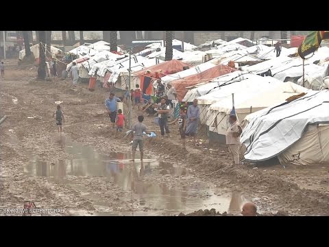 شاهد الأمطار تشرد نازحي خيمة العراق