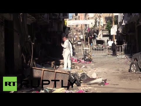 شاهد الشرطة والطب الشرعي يعاينون موقع التفجير